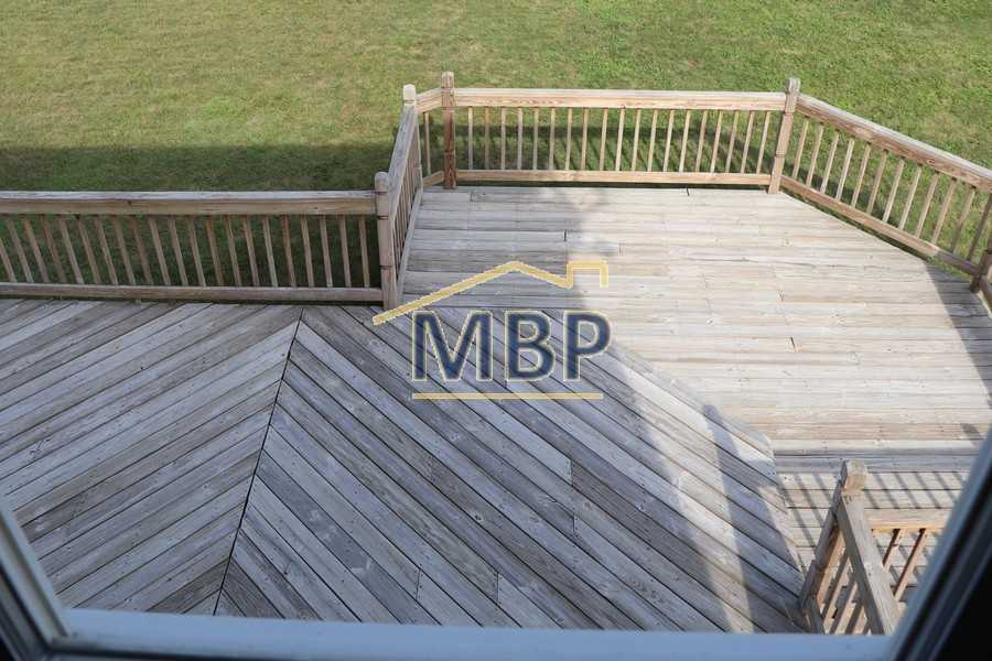 Deck powerwashed, bleached and sanded