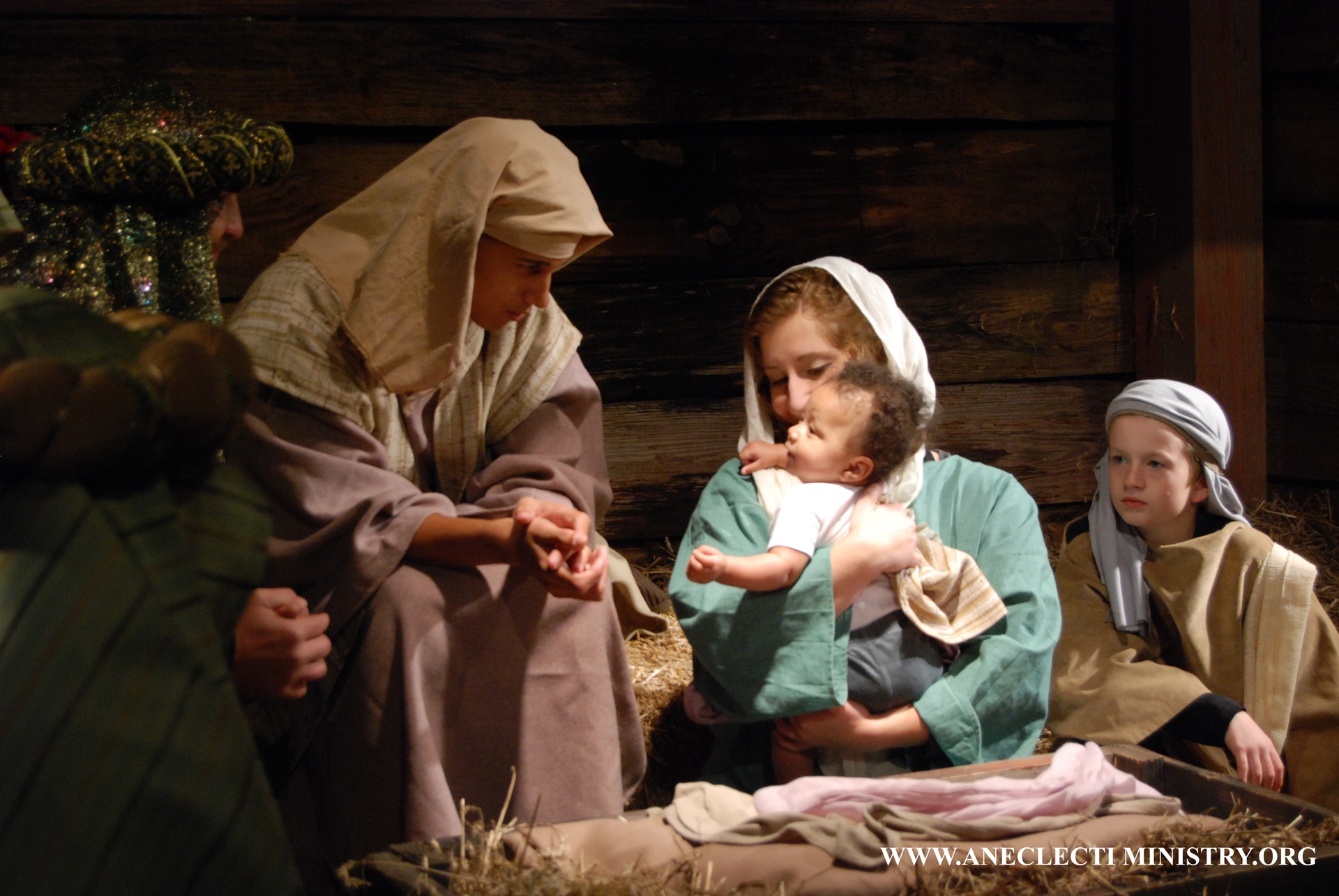 Joseph, Mary and Jesus and a shepherd boy